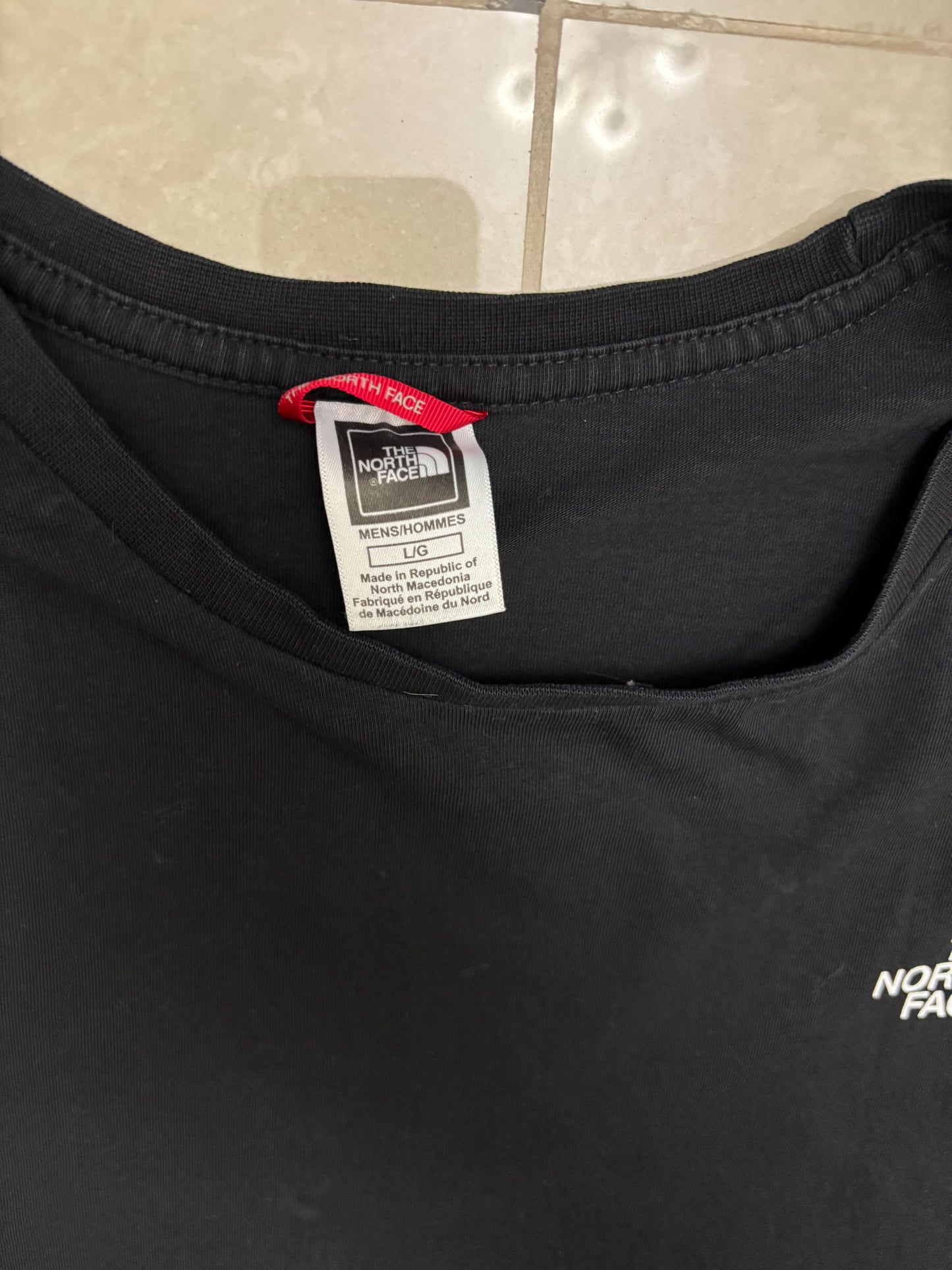 The North Face “Never Stop Exploring” Black Long Sleeve Graphic T-Shirt - M