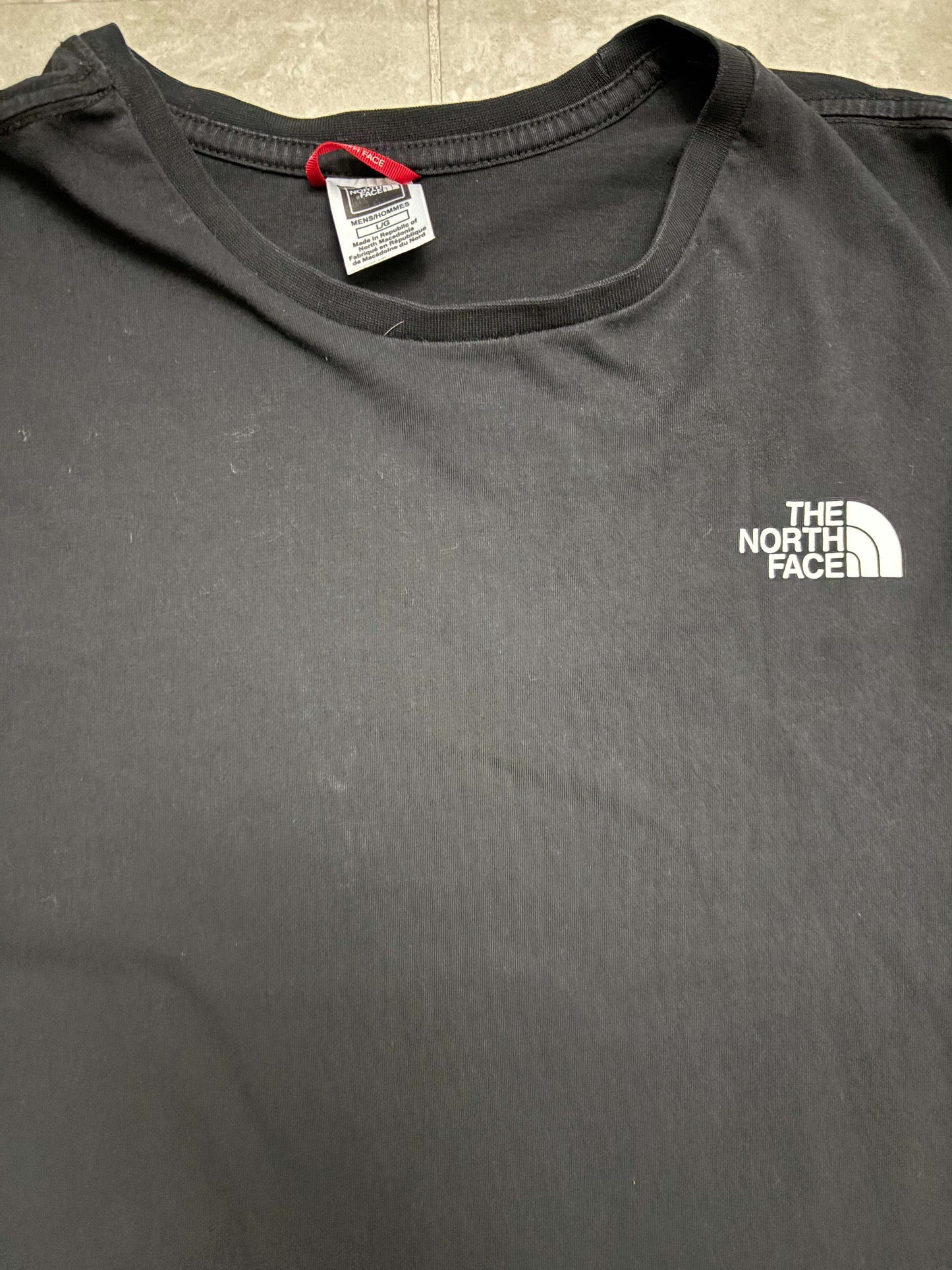 The North Face “Never Stop Exploring” Black Long Sleeve Graphic T-Shirt - M