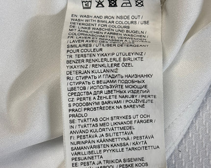 MC-06942-1313-CRCL-010-wash_tag