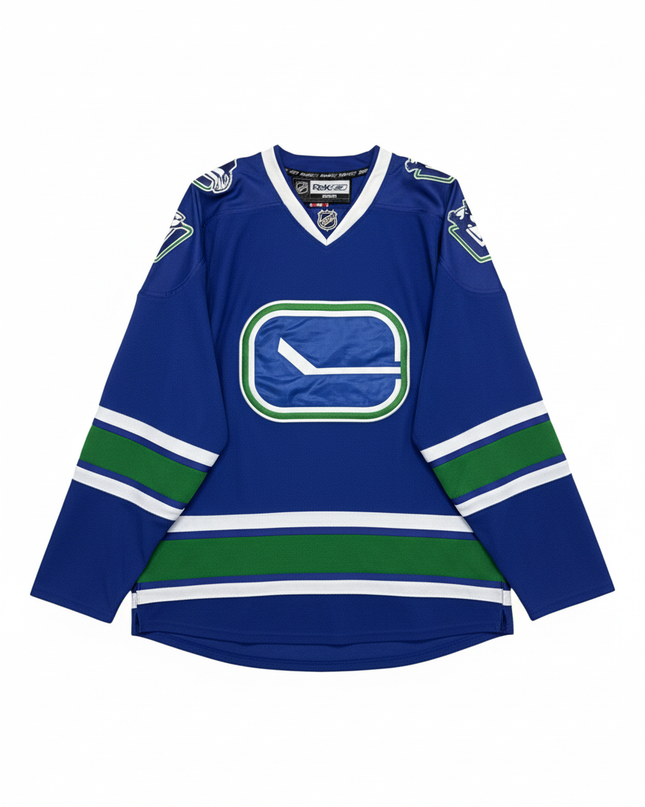 NHL Reebok Blue Vancouver Canucks Stick-in-Rink Jersey