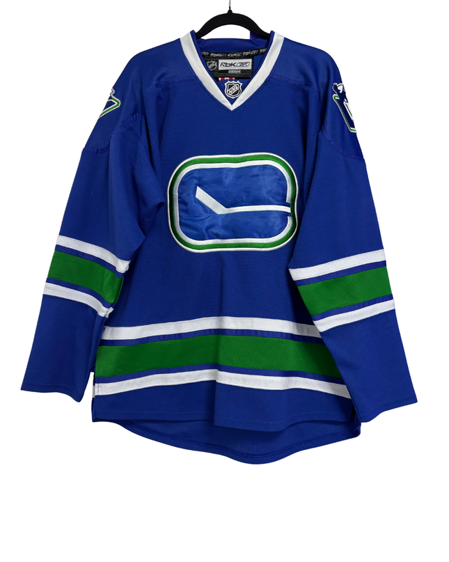 NHL Reebok Blue Vancouver Canucks Stick-in-Rink Jersey