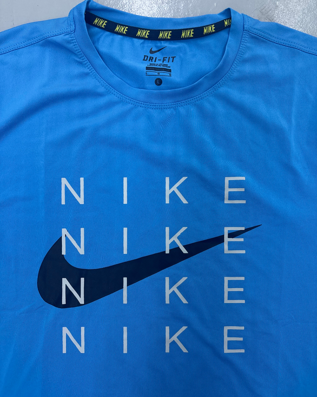Nike Dri-Fit Blue Graphic Tee – Repeated Logo Print - S