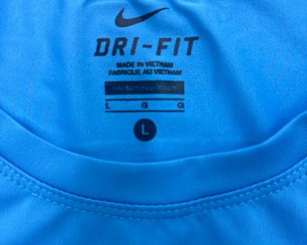Nike Dri-Fit Blue Graphic Tee – Repeated Logo Print - S