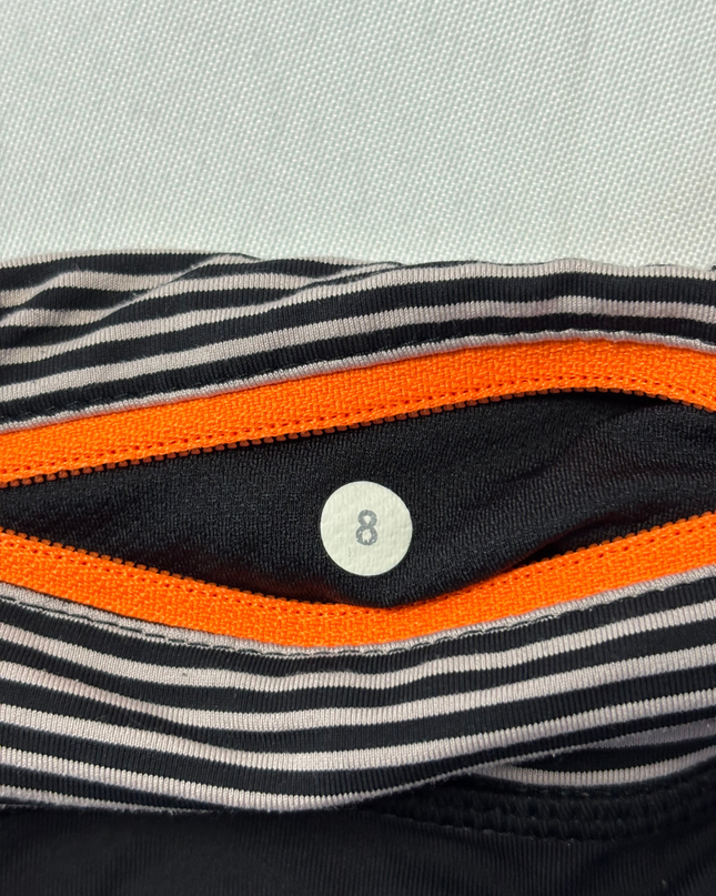 Lululemon Black Mixed-Media Performance Leggings with Floral Accents