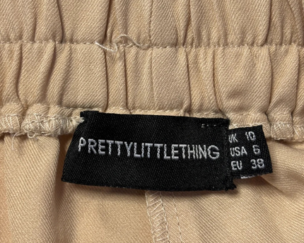 PrettyLittleThing Beige Flared High-Waist Shorts