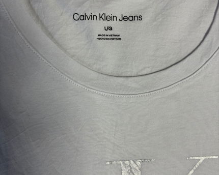 Calvin Klein Jeans White T-Shirt with Silver Metallic Logo