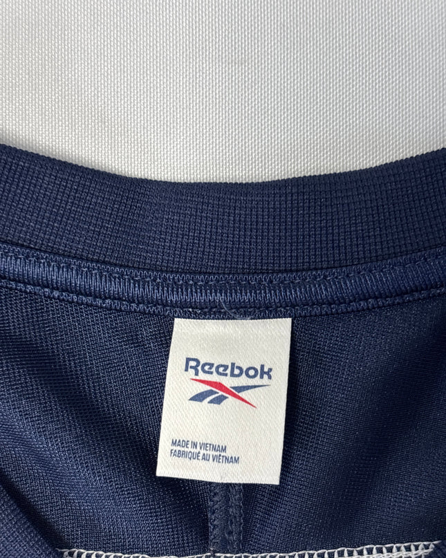 MC-06349-TSH-FKV006-brand_tag