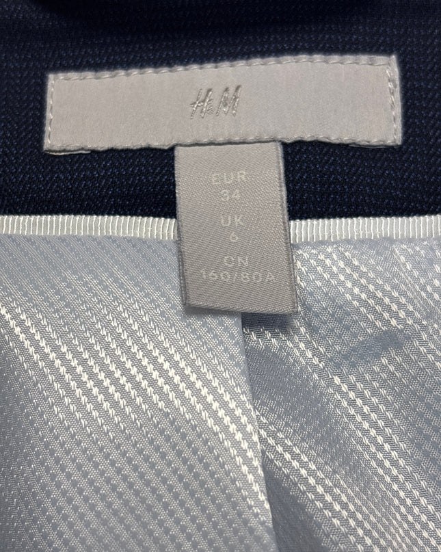MC-06742-COT-3PLGZ001-brand_tag