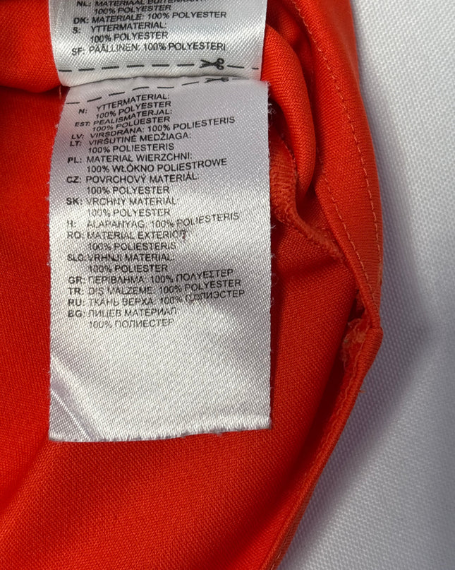 MC-06350-TSH-FKV006-brand_tag