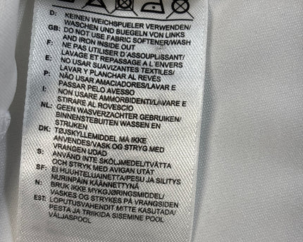 MC-06945-1313-CRCL-010-wash_tag