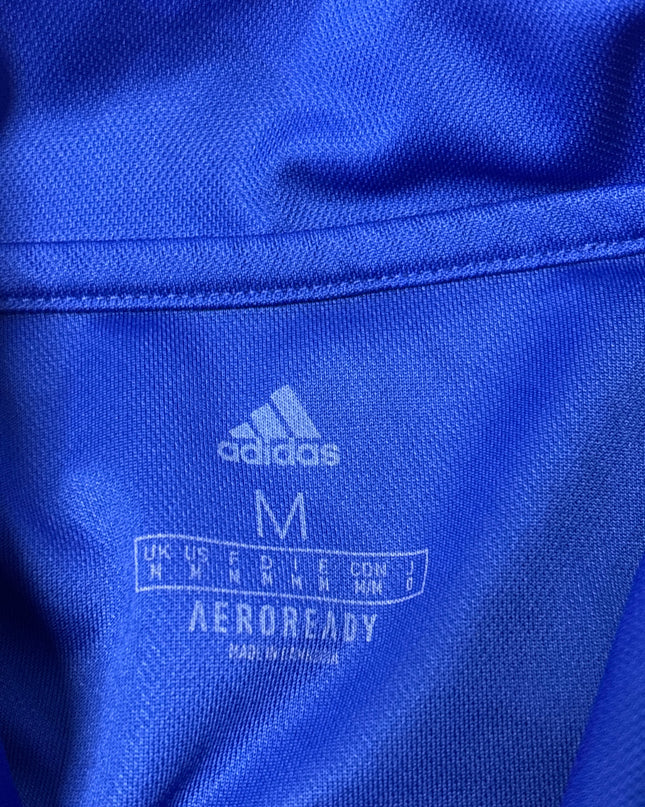 MC-06344-TSH-FKV006-brand_tag