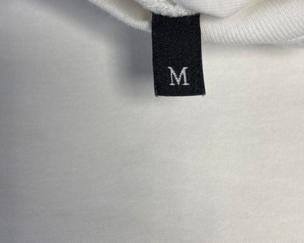 MC-06153-TSH-3PAAJ8002-brand_tag